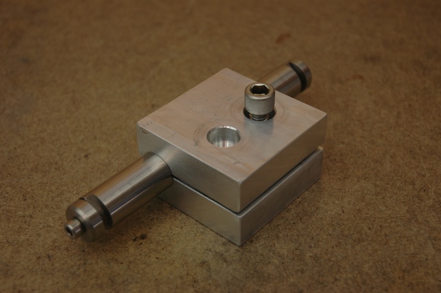 The axle block clamp with a rear axle installed.