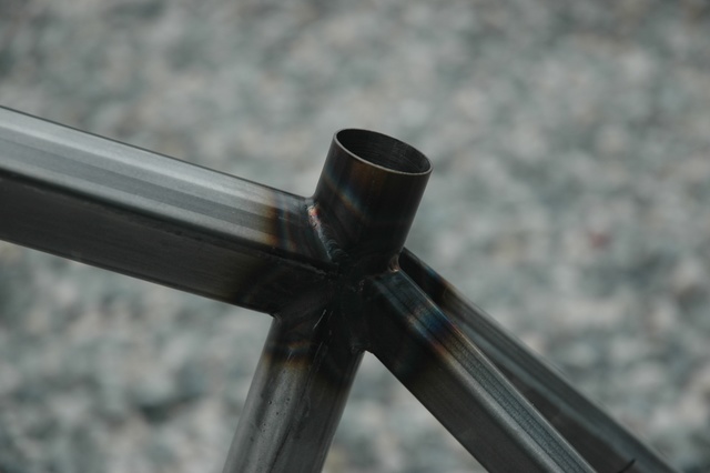 Closeup of seat tube showing the lines of the shaped top tube and seat stays.
